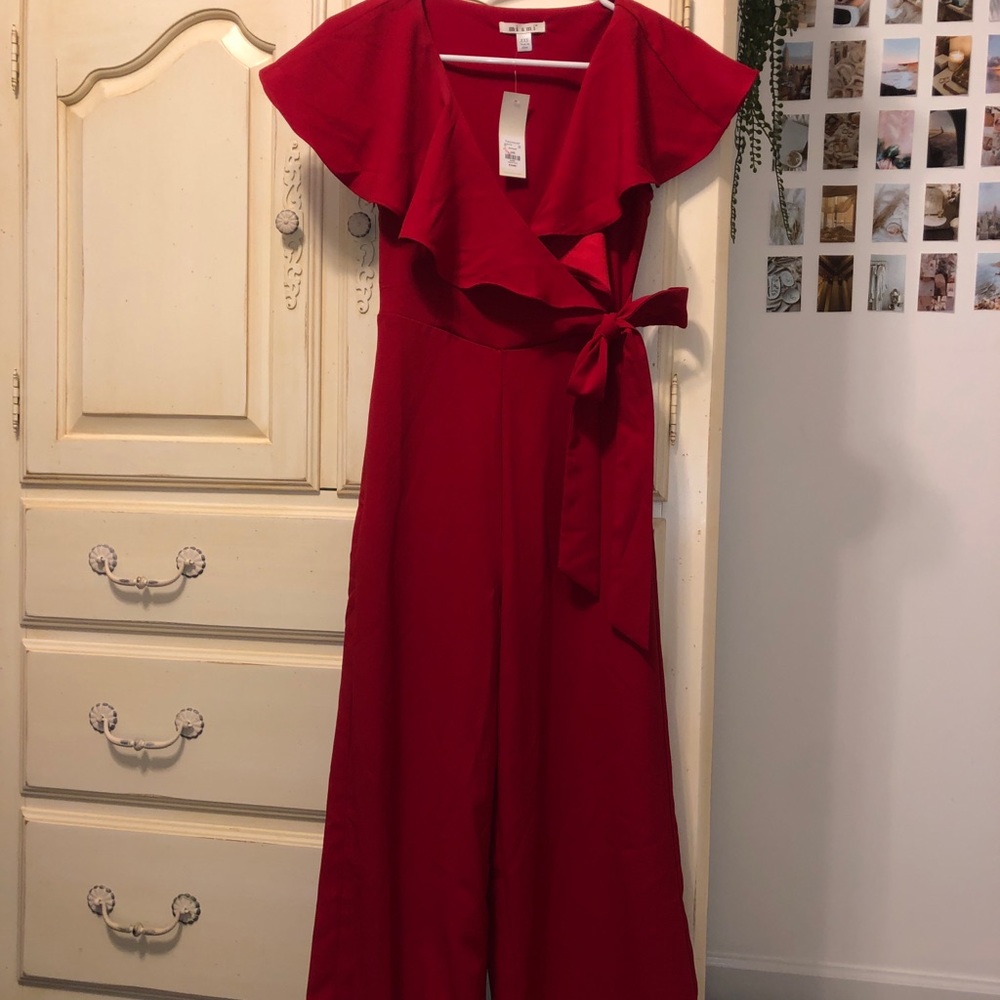 Francesca’s red jumpsuit